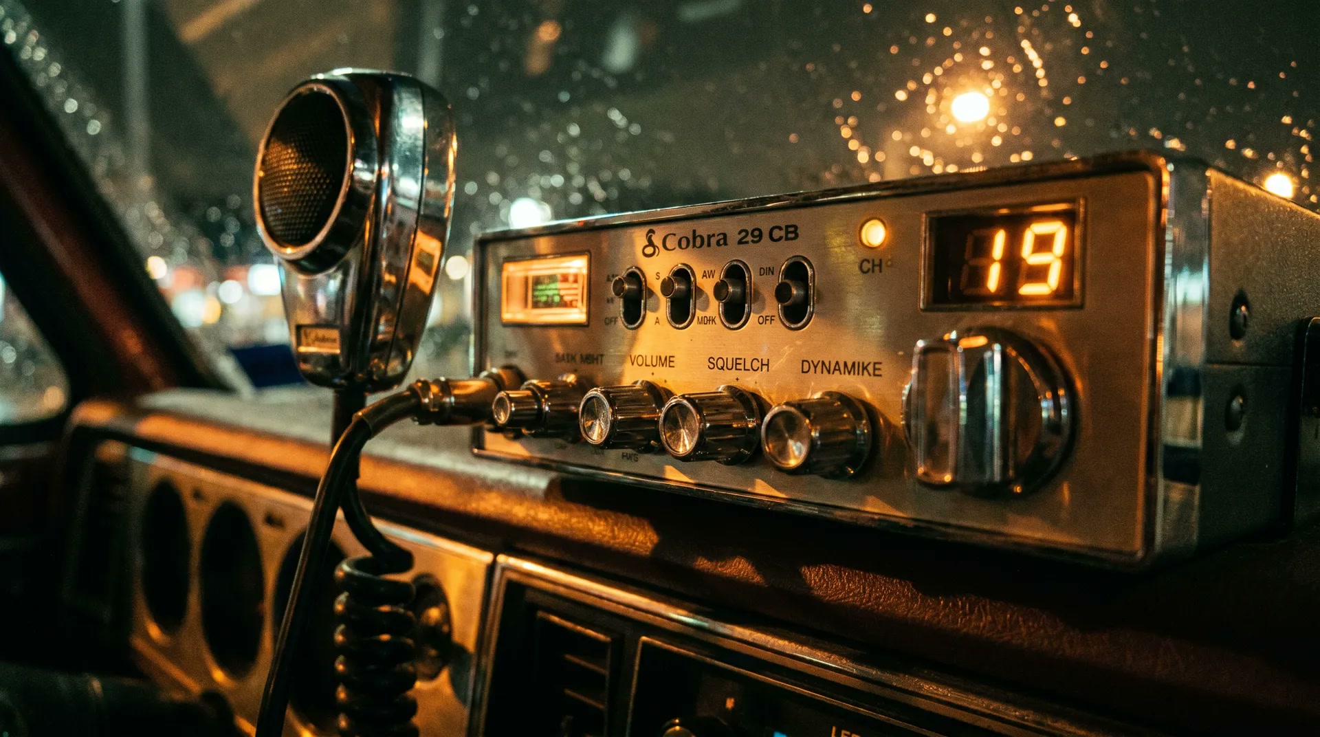 Close-up of a CB radio dial with amber LED channel display